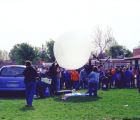 filling balloons in front of kids